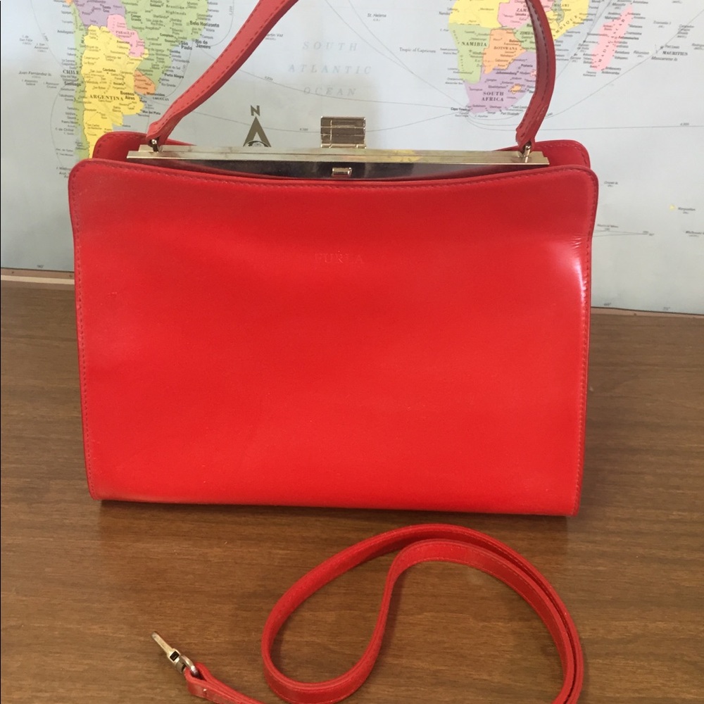 Furla structured handled bag w/strap.